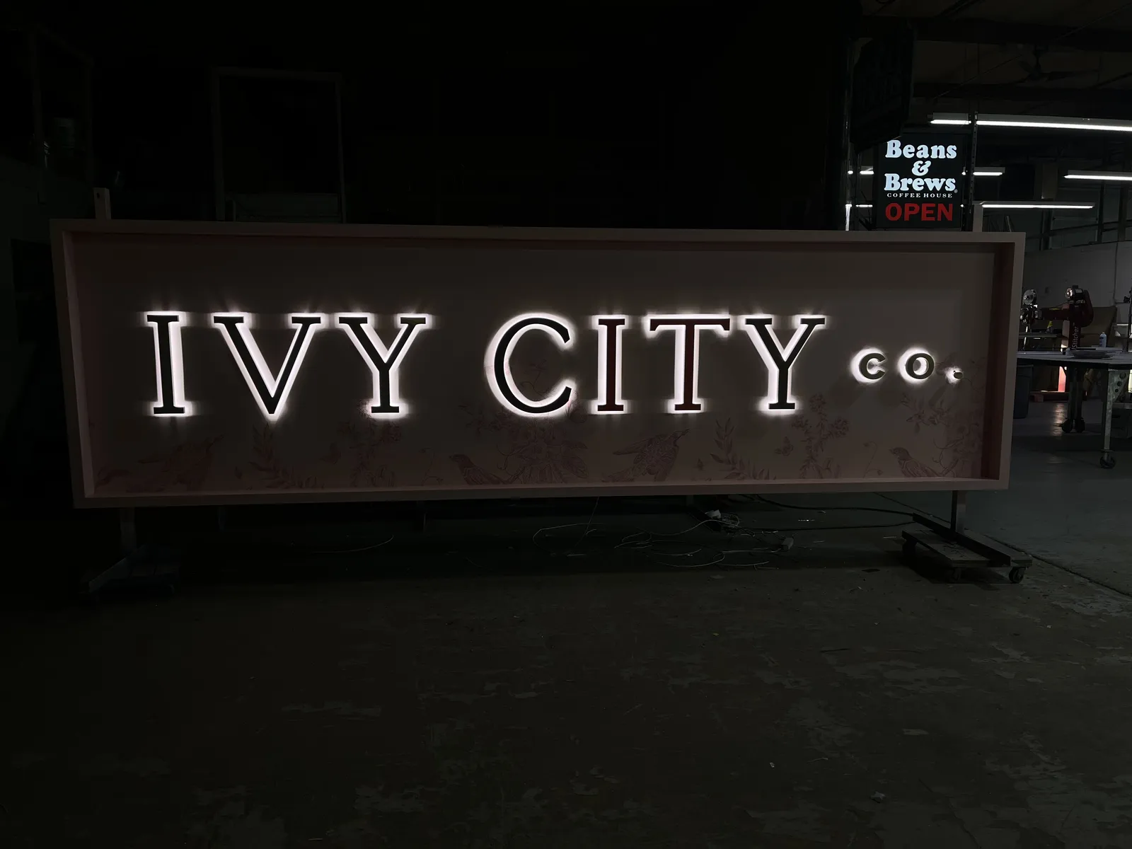 Ivy City Co. — Illuminated Sign Fabrication — Internally Lit Cabinet with Floral-Detailed Face