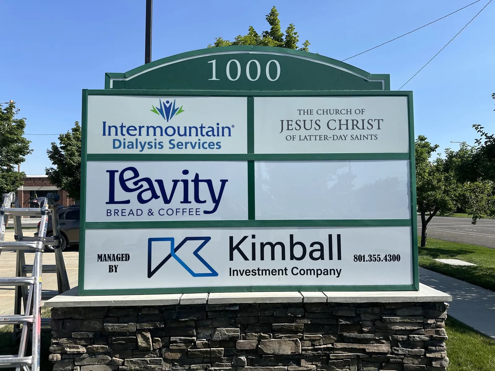 Intermountain Dialysis — Multi-Tenant Monument Sign — Cabinet Monument with Tenant Panels on Stacked-Stone Base