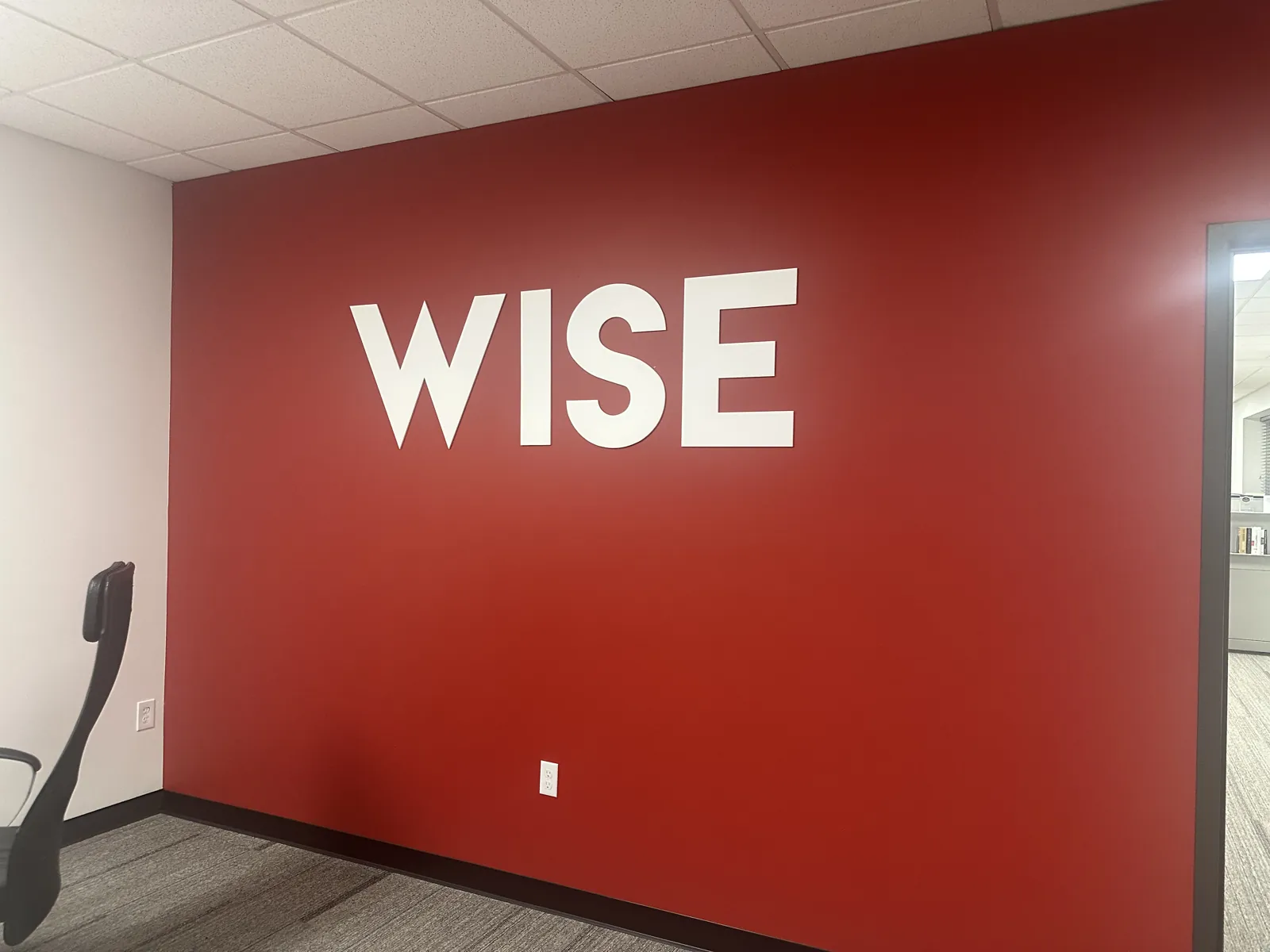 WISE — Red Feature Wall — Full-Wall Color Wrap with Dimensional Letters